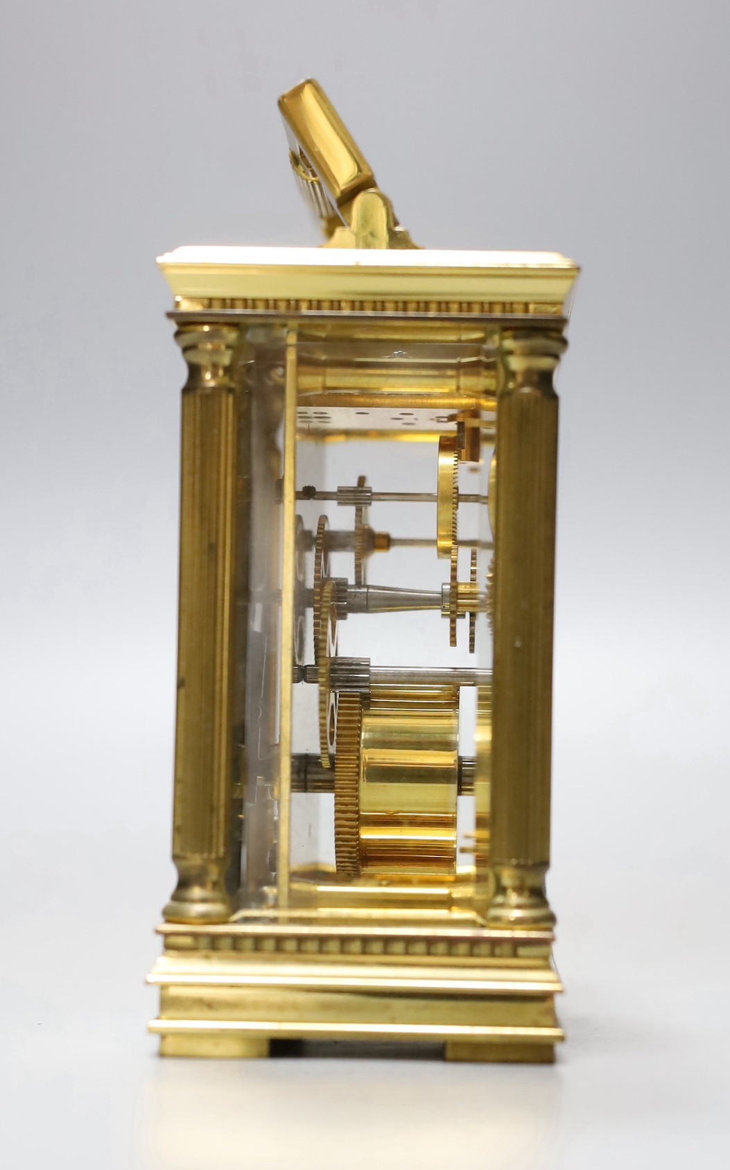 A French brass carriage timepiece, Mappin & Webb, 11.5 cms high.